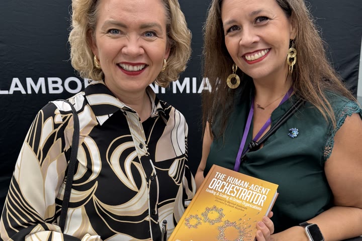 Tarja and a friend with the book at the Lamborghini Miami evening.